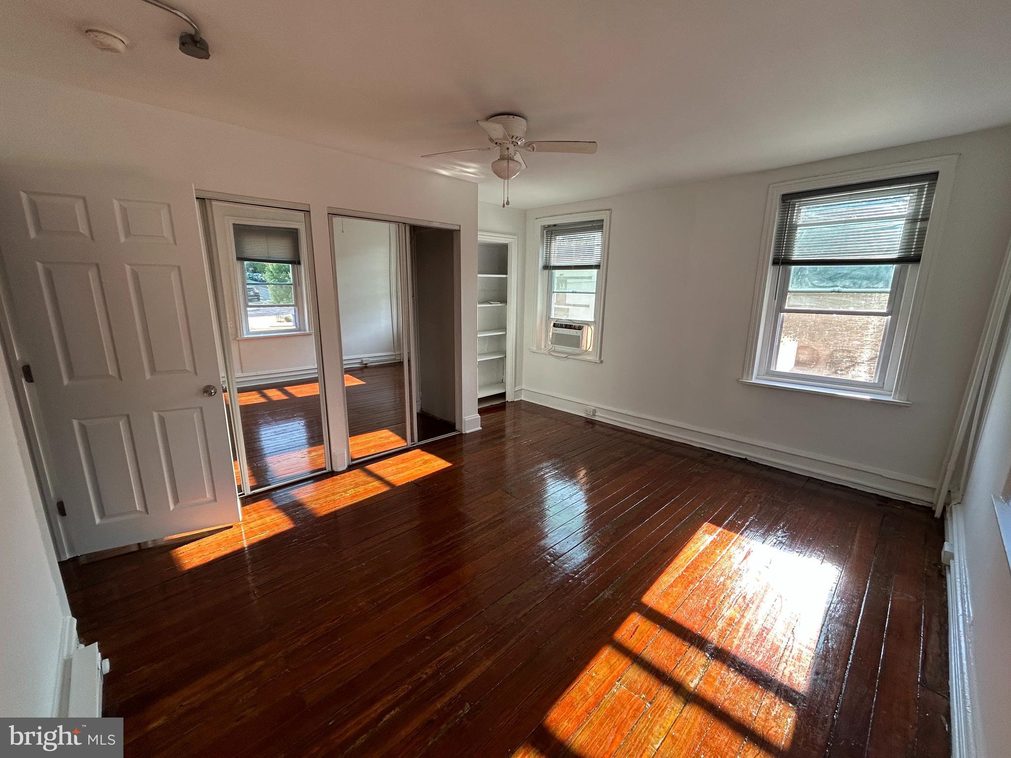 3700 Midvale Avenue, Unit 2 Philadelphia, PA 19129 - Photo 4 of 13 wooden floor in an empty room with a window