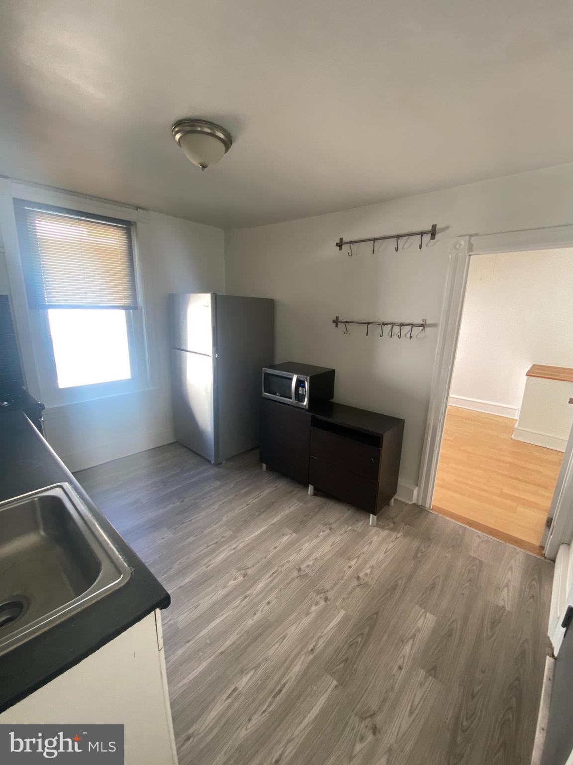 3700 Midvale Avenue, Unit 2 Philadelphia, PA 19129 - Photo 9 of 13 a view of a kitchen with furniture and a sink
