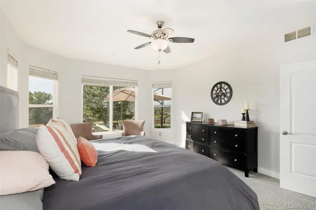 a bed room with a bed and a window