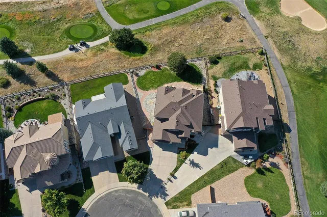 a view of a city with lawn chairs