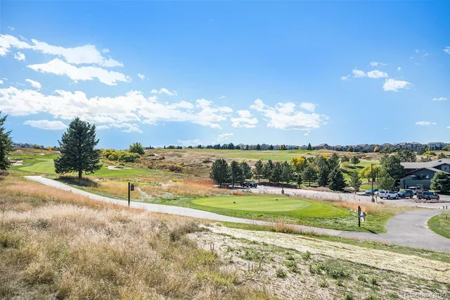 an aerial view of a house with swimming pool