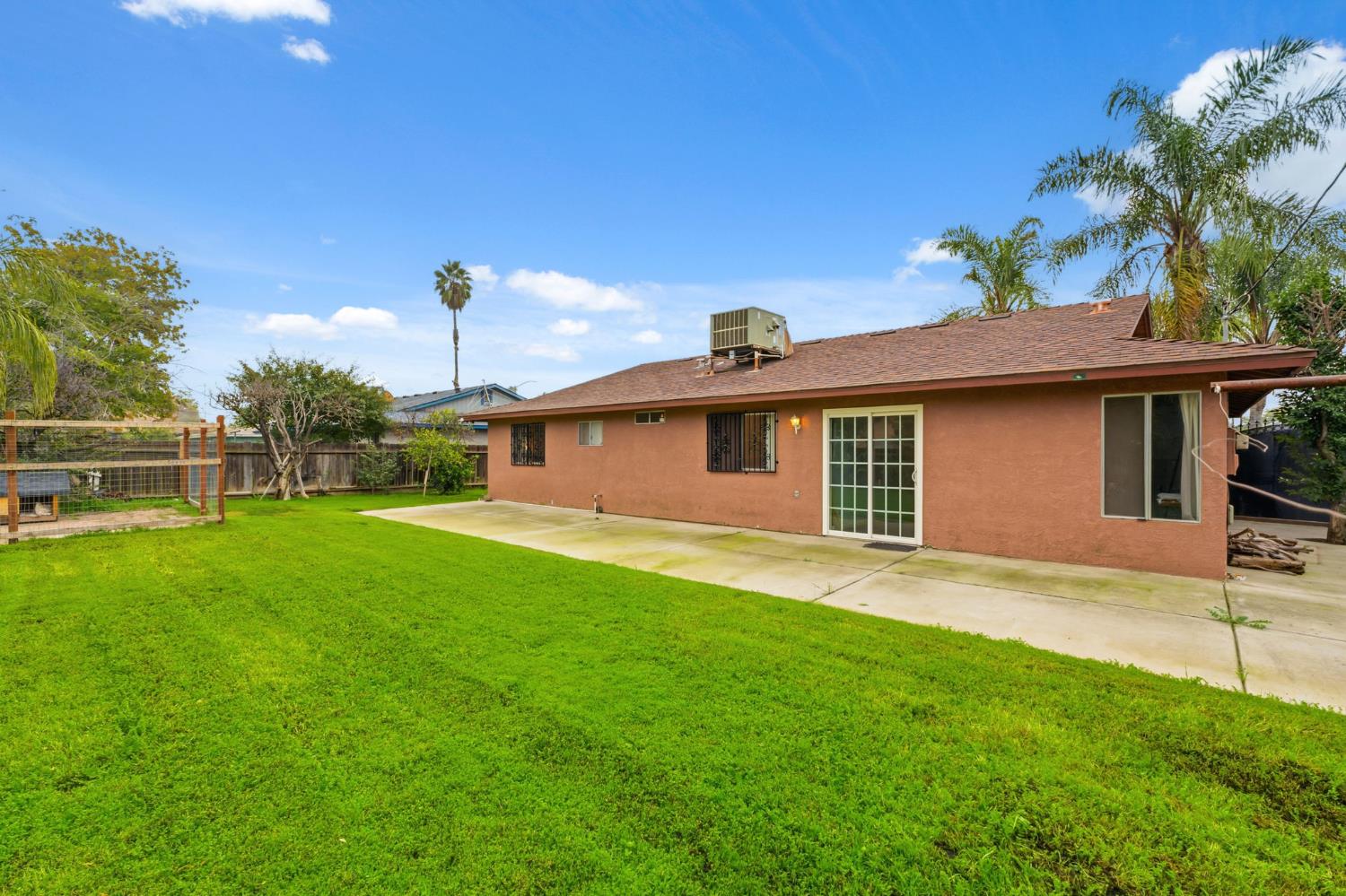 204 West Cesar Chavez Boulevard Fresno, CA 93706 - Photo 28 of 28 a front view of a house with a garden