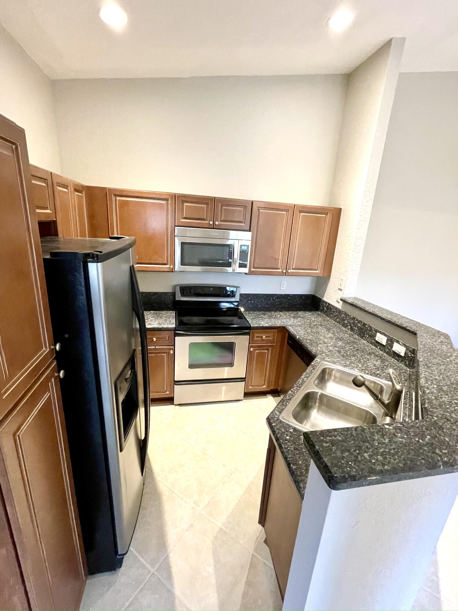 3043 Laurel Ridge Circle Riviera Beach, FL 33404 - Photo 12 of 35 KITCHEN 2