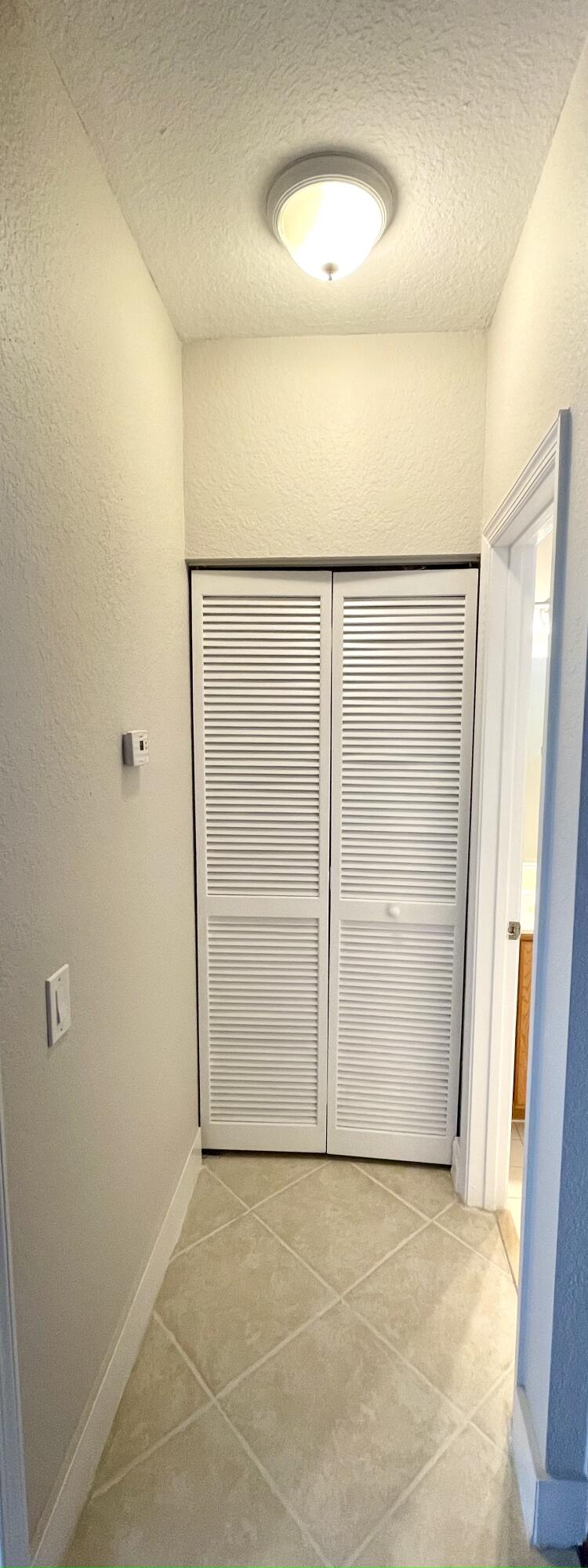 3043 Laurel Ridge Circle Riviera Beach, FL 33404 - Photo 18 of 35 AC DOOR