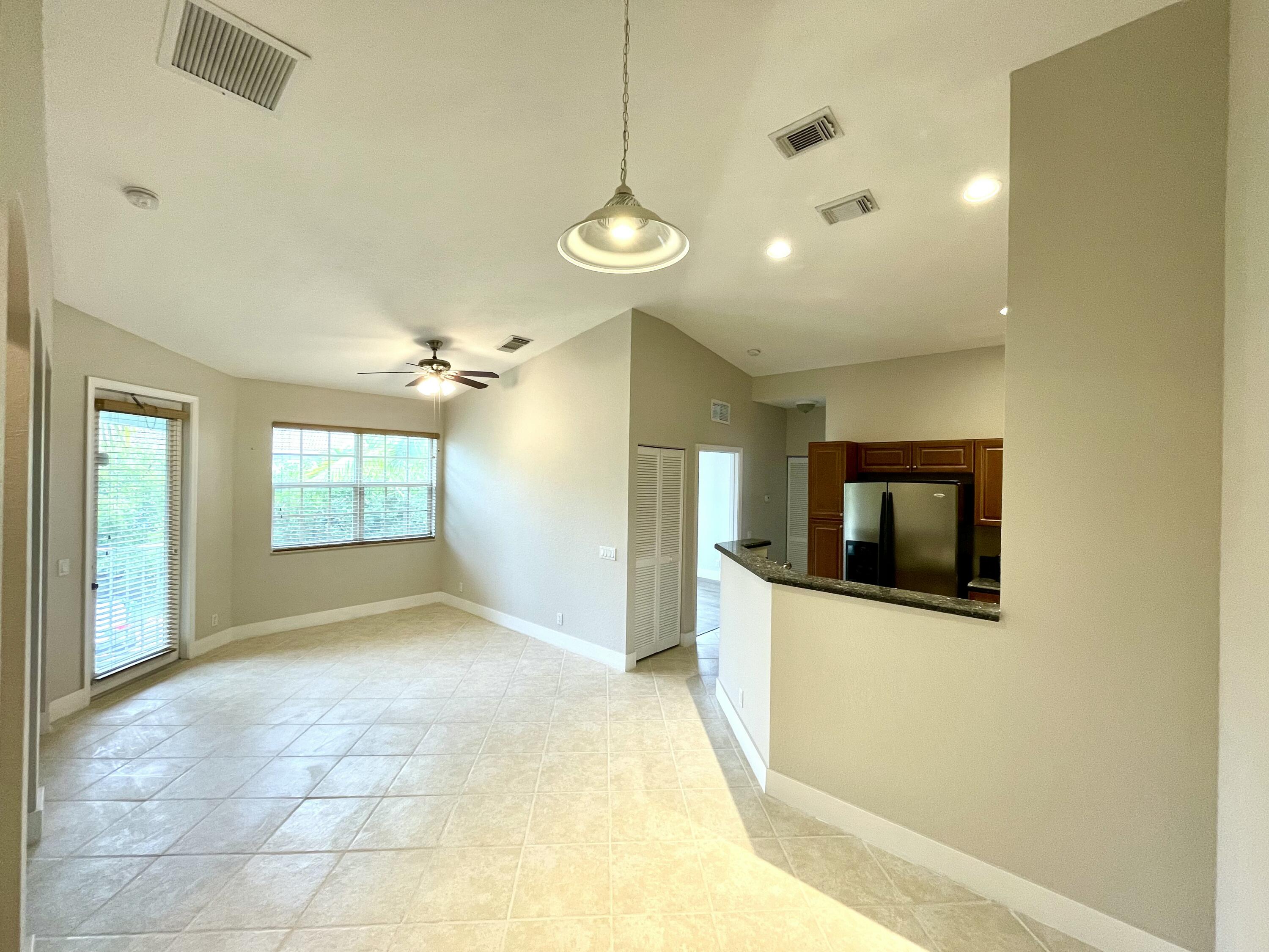 3043 Laurel Ridge Circle Riviera Beach, FL 33404 - Photo 9 of 35 LIVING/DINNING