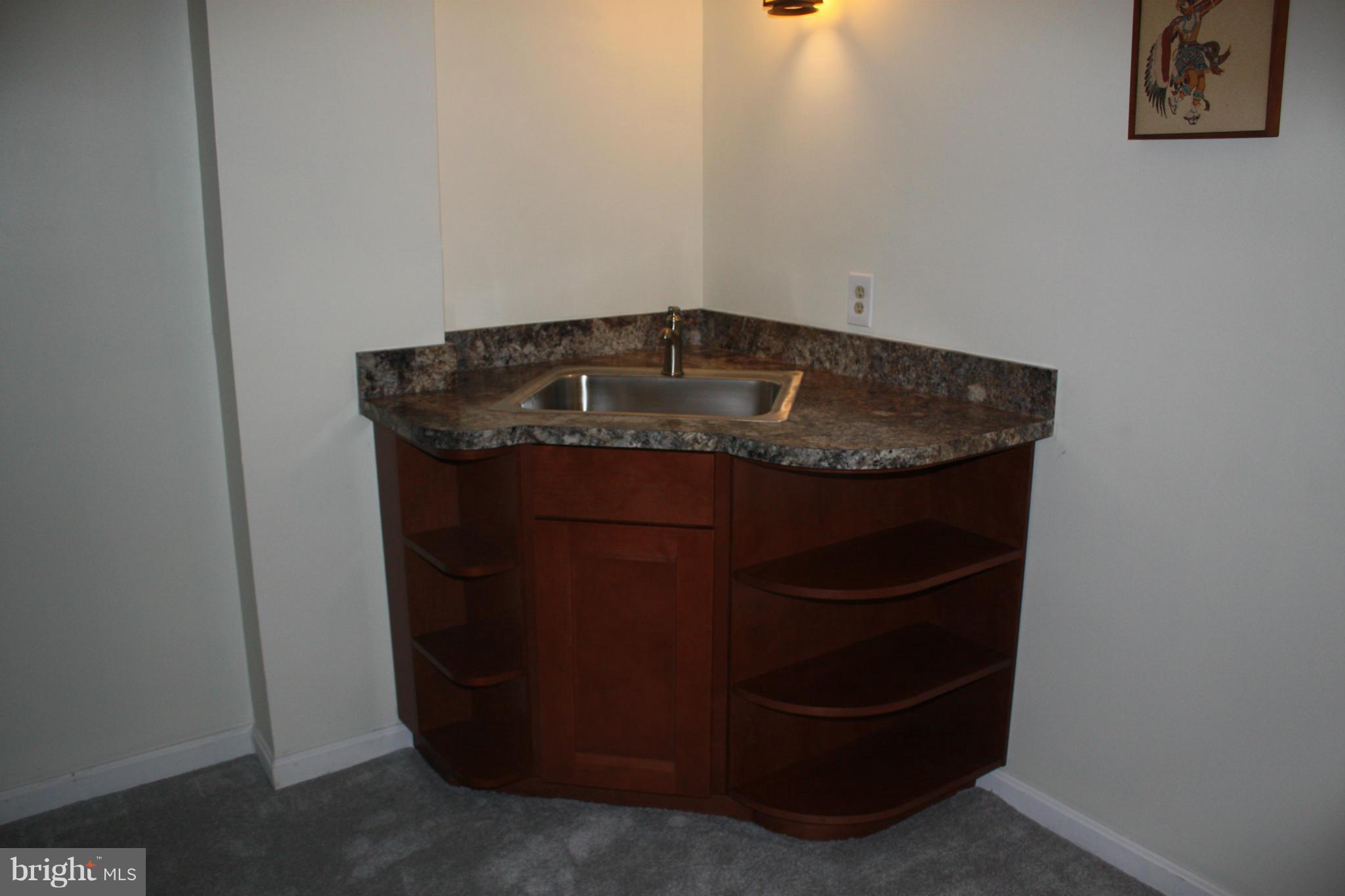 1560 Lottie Fowler Road Prince Frederick, MD 20678 - Photo 25 of 27 Wet bar in basement