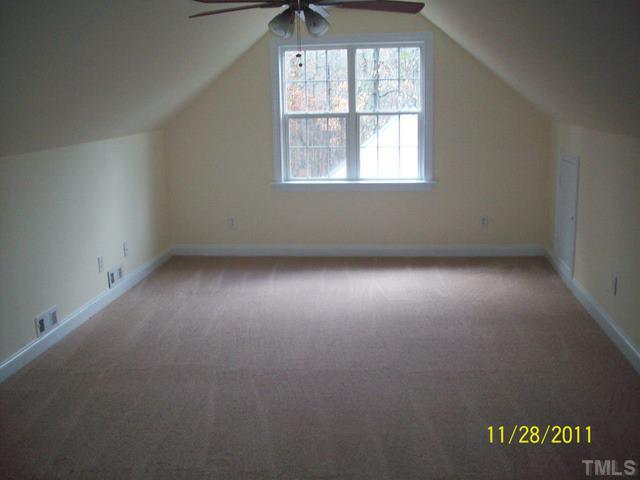 4405 Irene Way Raleigh, NC 27603 - Photo 3 of 12 an empty room with a window