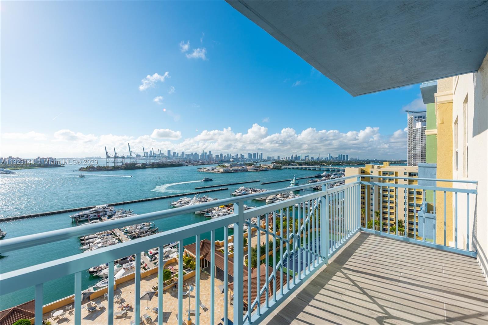 90 Alton Road, Unit 1602 Miami Beach, FL 33139 - Photo 15 of 34 a view of a balcony with city
