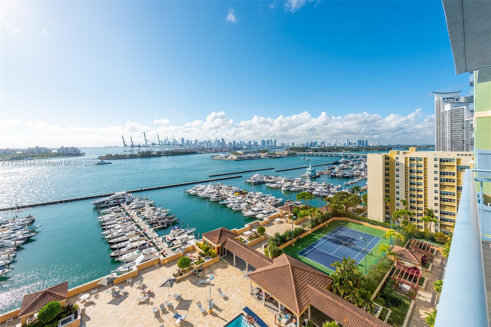 90 Alton Road, Unit 1602 Miami Beach, FL 33139 - Photo 29 of 34 a view of a city with an ocean