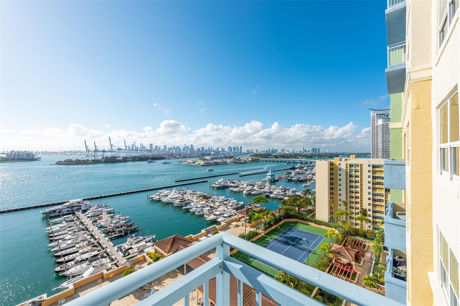 90 Alton Road, Unit 1602 Miami Beach, FL 33139 - Photo 6 of 34 a view of a lake from a balcony