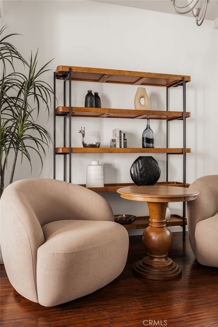 4612 Peck Road, Unit D El Monte, CA 91732 - Photo 12 of 57 a living room with furniture and a wooden floor