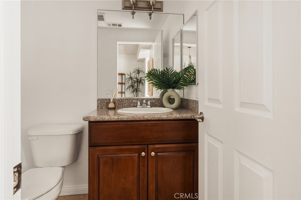 4612 Peck Road, Unit D El Monte, CA 91732 - Photo 19 of 57 a bathroom with a sink toilet and mirror