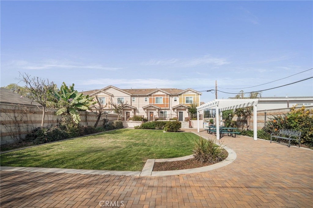 4612 Peck Road, Unit D El Monte, CA 91732 - Photo 37 of 57 a view of a swimming pool with a garden