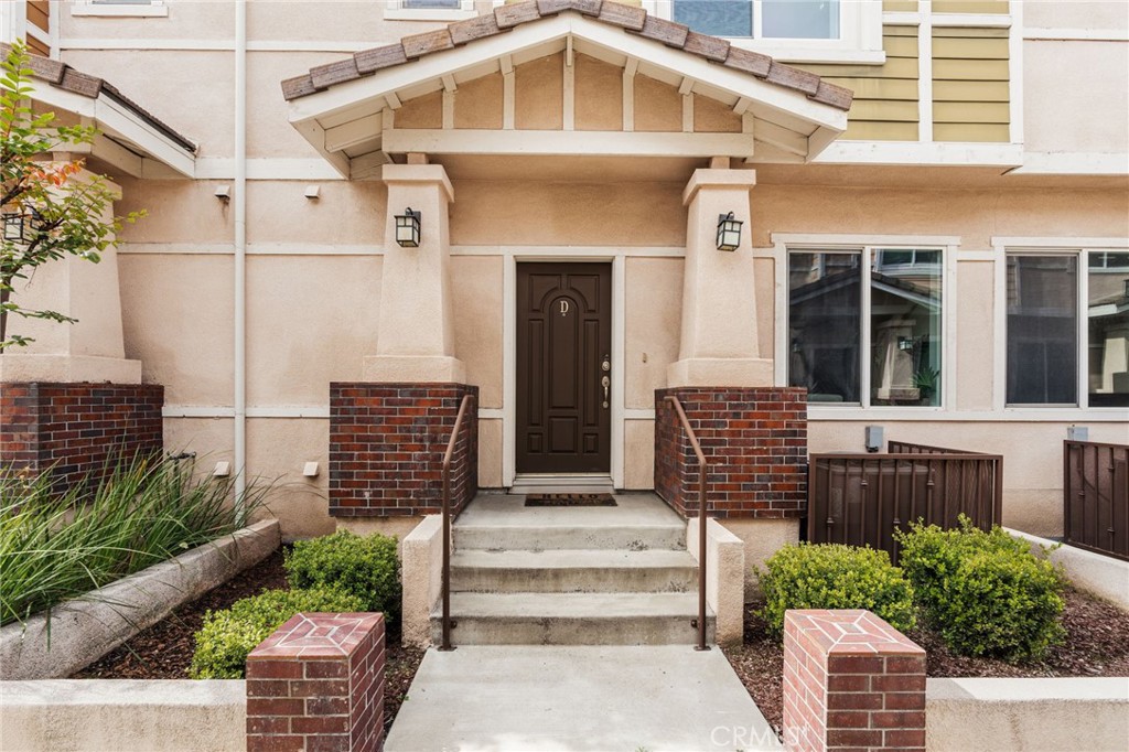 4612 Peck Road, Unit D El Monte, CA 91732 - Photo 57 of 57 a front view of a house with a yard