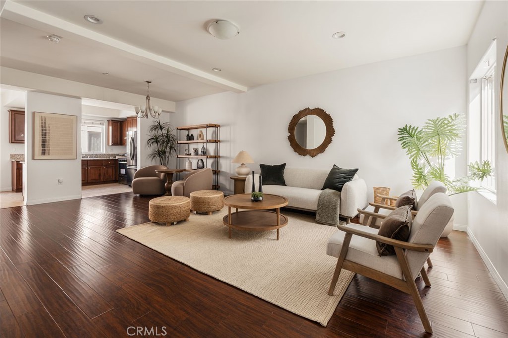 4612 Peck Road, Unit D El Monte, CA 91732 - Photo 6 of 57 a living room with furniture kitchen view and a wooden floor