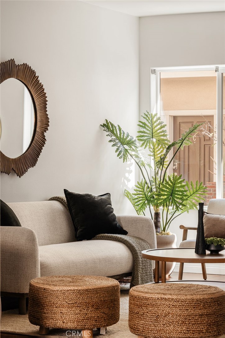 4612 Peck Road, Unit D El Monte, CA 91732 - Photo 10 of 57 a living room with furniture and a potted plant