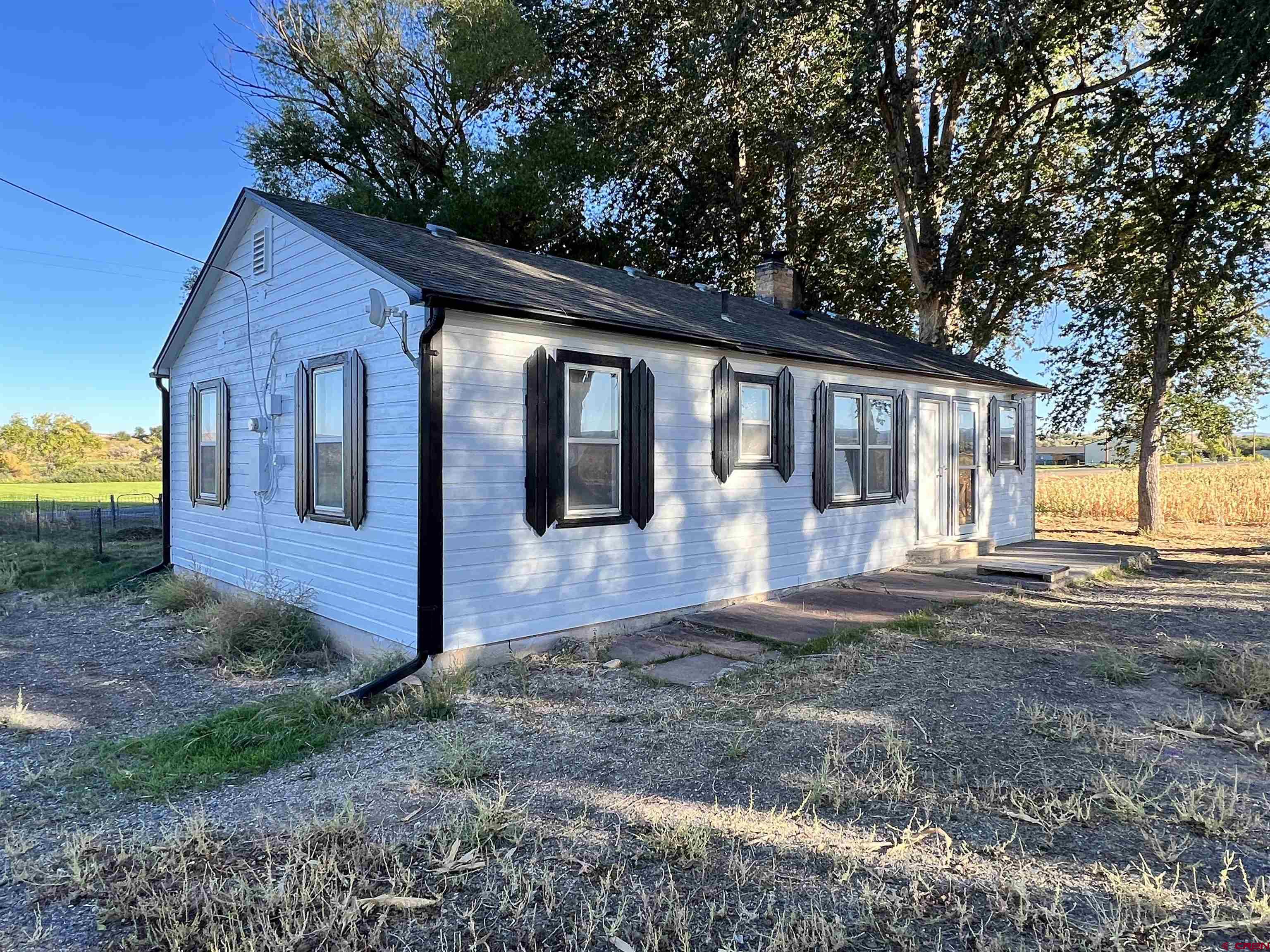 8139 5600th Road Olathe, CO 81425 - Photo 10 of 30 a view of a house with a yard