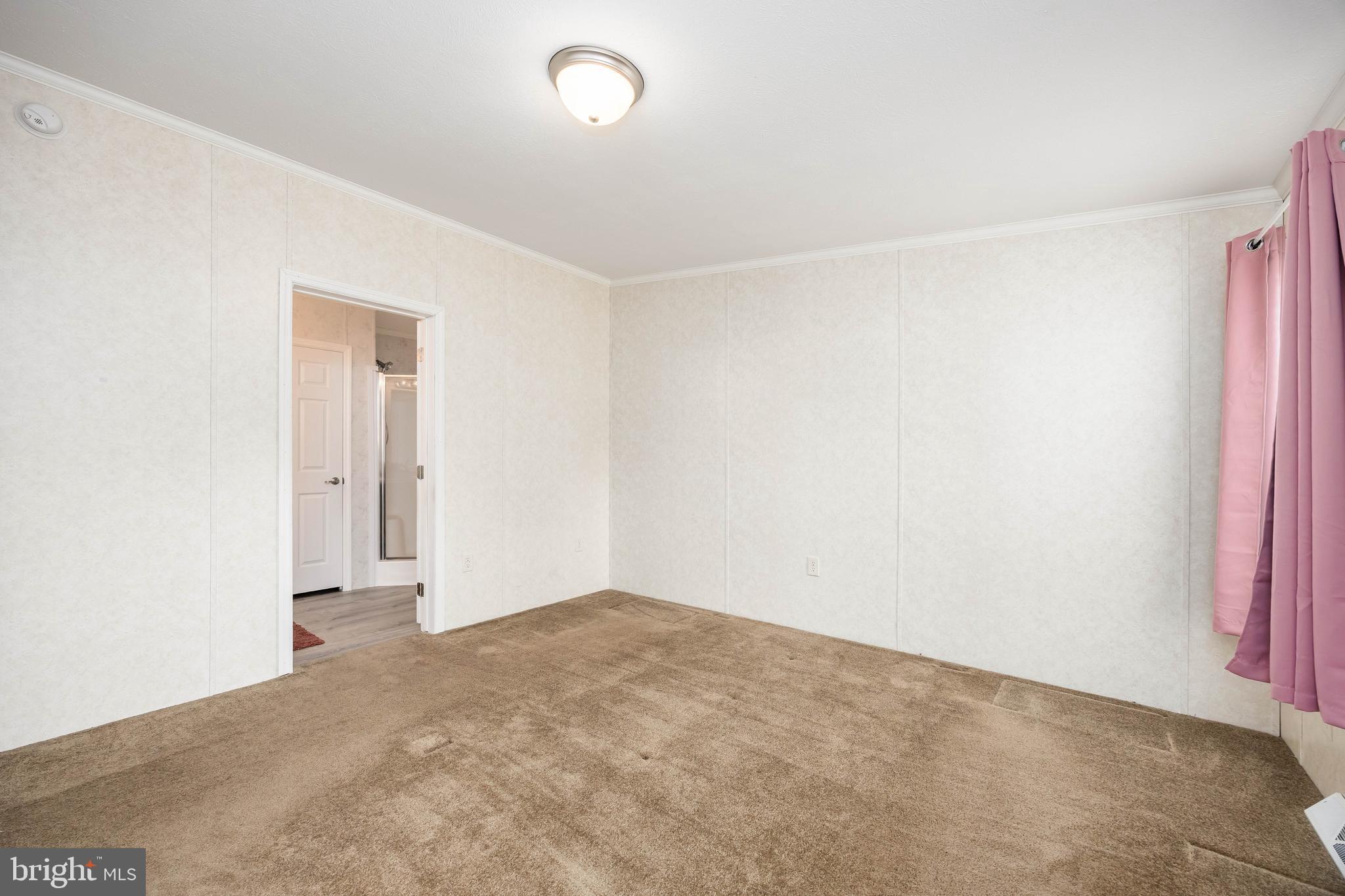 4258 Smith Road Salisbury, MD 21801 - Photo 29 of 43 an empty room with a empty space and a window