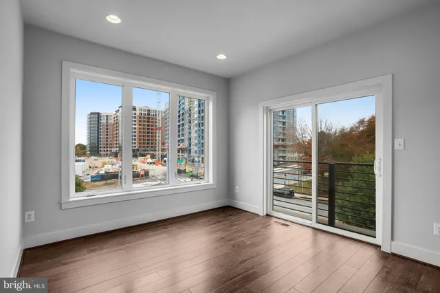 a bathroom with a toilet sink and shower