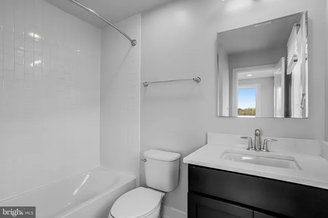 a view of a brick building from a balcony