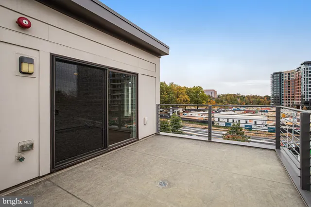 a view of a brick house with windows