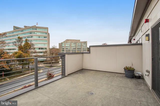 a front view of a building with garden