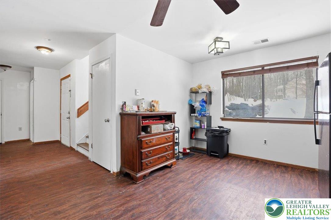 3301 Windermere Drive Bushkill, PA 18324 - Photo 17 of 71 a view of an empty room with window and wooden floor