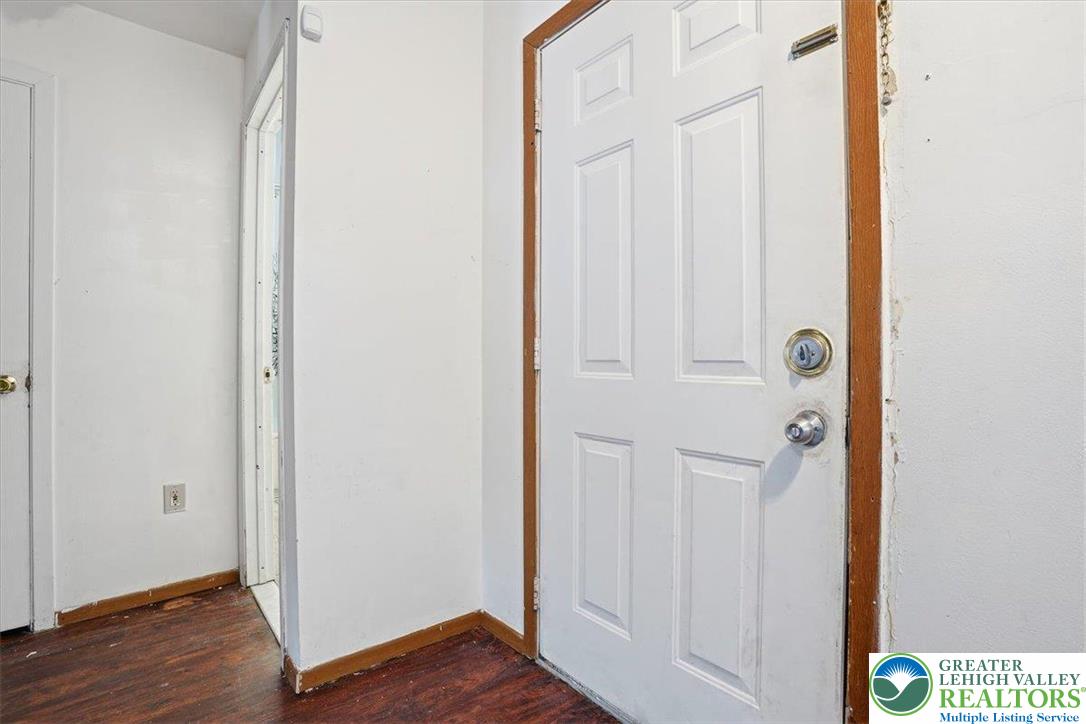 3301 Windermere Drive Bushkill, PA 18324 - Photo 23 of 71 a view of a hallway with wooden floor