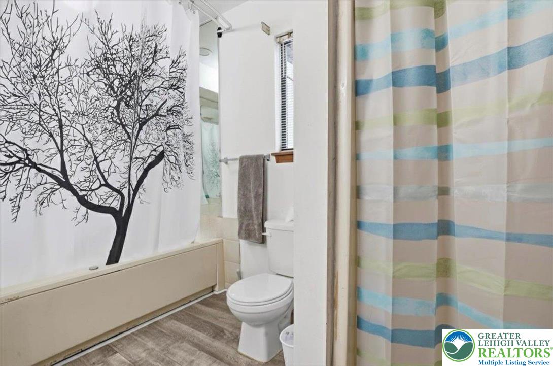 3301 Windermere Drive Bushkill, PA 18324 - Photo 35 of 71 a bathroom with a toilet and a shower