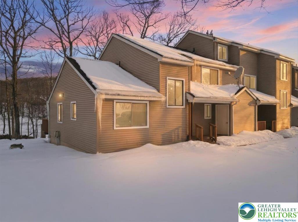 3301 Windermere Drive Bushkill, PA 18324 - Photo 39 of 71 a front view of a house with a yard
