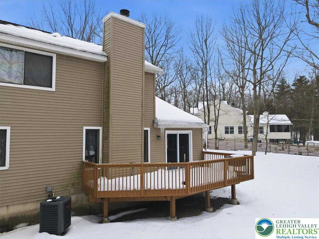 3301 Windermere Drive Bushkill, PA 18324 - Photo 42 of 71 a view of a house with a wooden deck