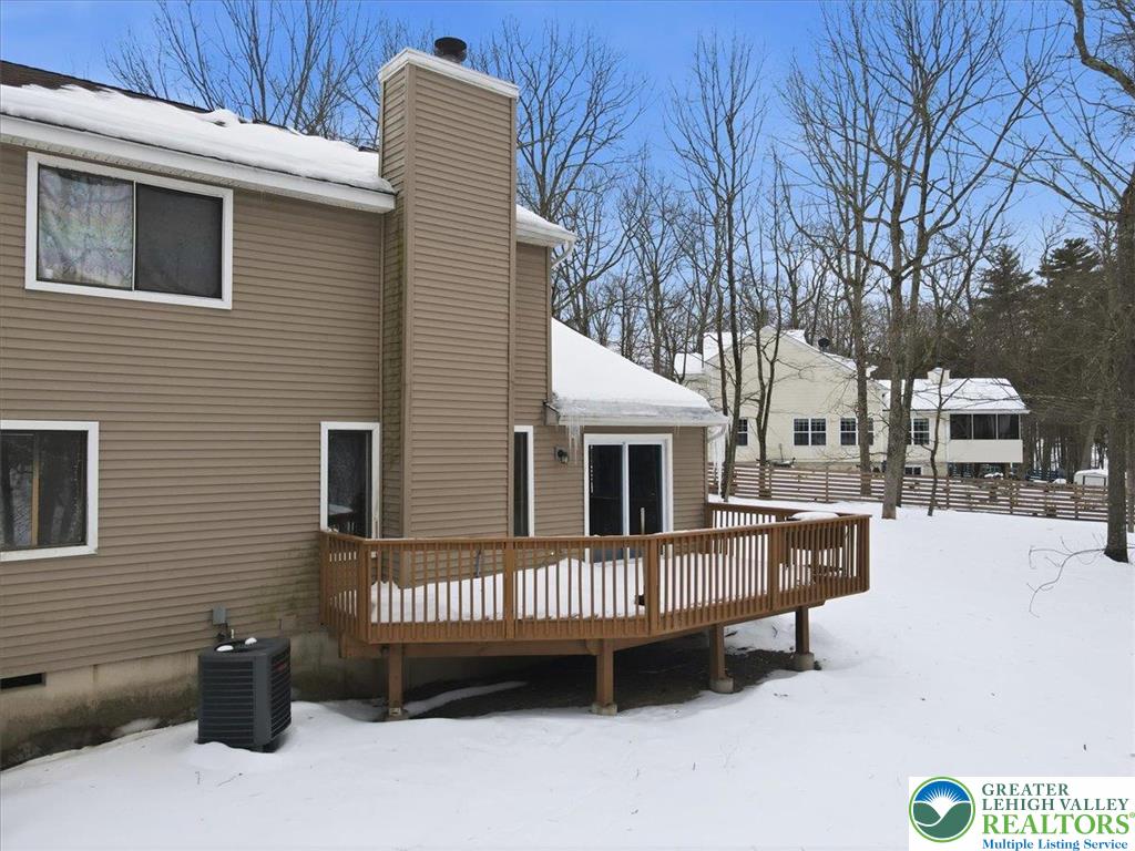 3301 Windermere Drive Bushkill, PA 18324 - Photo 43 of 71 a view of a house with a roof deck