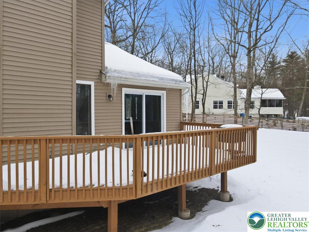 3301 Windermere Drive Bushkill, PA 18324 - Photo 46 of 71 a view of a brick house with a small yard