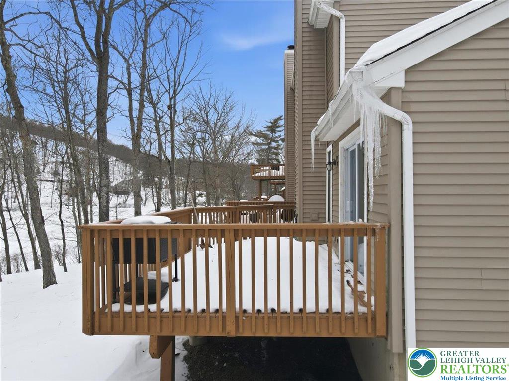 3301 Windermere Drive Bushkill, PA 18324 - Photo 48 of 71 a view of a brick house with a small yard