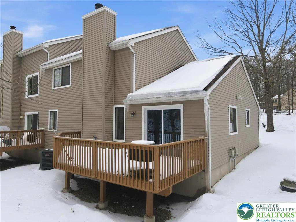 3301 Windermere Drive Bushkill, PA 18324 - Photo 49 of 71 a view of a house with a wooden fence