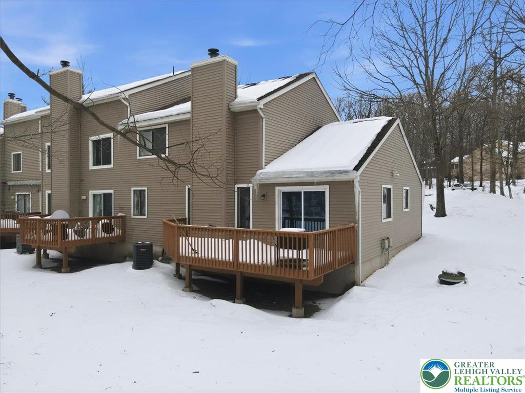 3301 Windermere Drive Bushkill, PA 18324 - Photo 50 of 71 a view of a house with a wooden deck