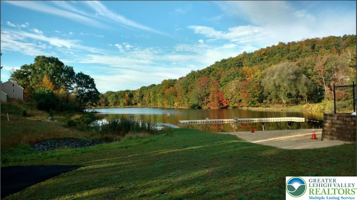 3301 Windermere Drive Bushkill, PA 18324 - Photo 70 of 71 a view of a lake with houses in the background