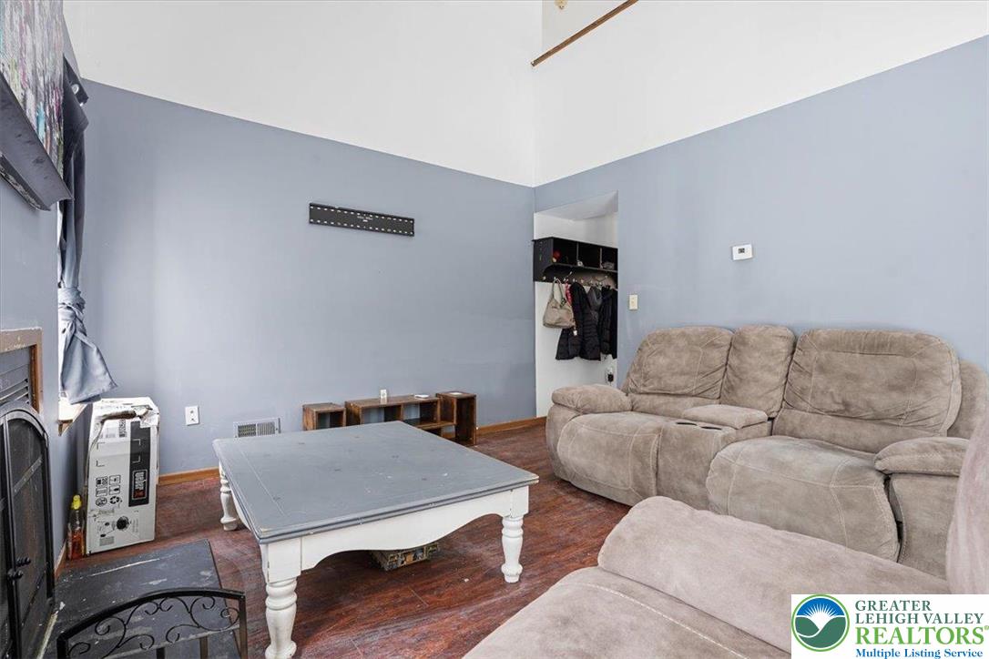 3301 Windermere Drive Bushkill, PA 18324 - Photo 7 of 71 a living room with furniture and a couch