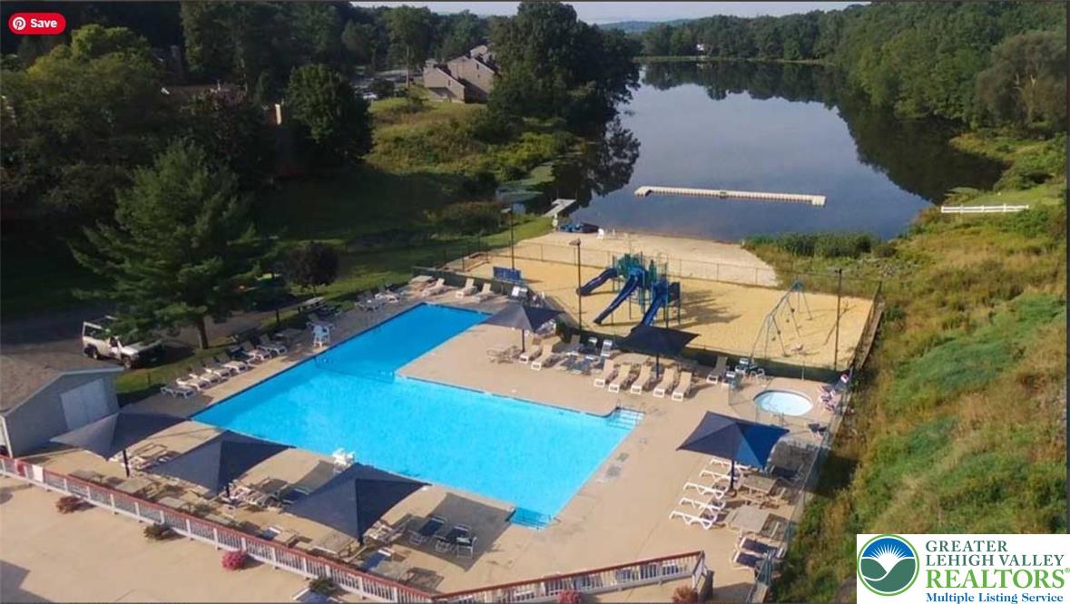 3301 Windermere Drive Bushkill, PA 18324 - Photo 71 of 71 an aerial view of a house with swimming pool and lake view