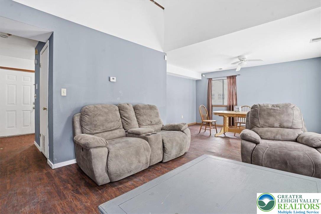 3301 Windermere Drive Bushkill, PA 18324 - Photo 8 of 71 a living room with furniture and a couch