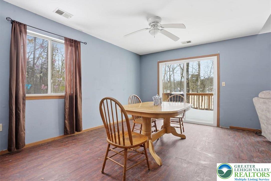 3301 Windermere Drive Bushkill, PA 18324 - Photo 9 of 71 a dining room with furniture and window
