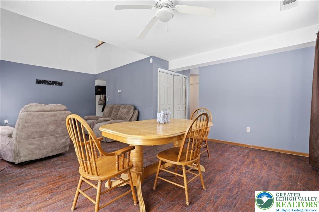 3301 Windermere Drive Bushkill, PA 18324 - Photo 10 of 71 a dining room with furniture and wooden floor