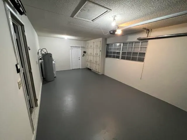 a view of a hallway with stairs