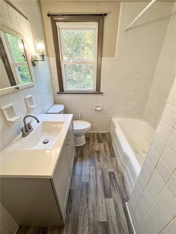 121 Heim Avenue Butler, PA 16001 - Photo 16 of 16 a bathroom with a sink a toilet and a bathtub