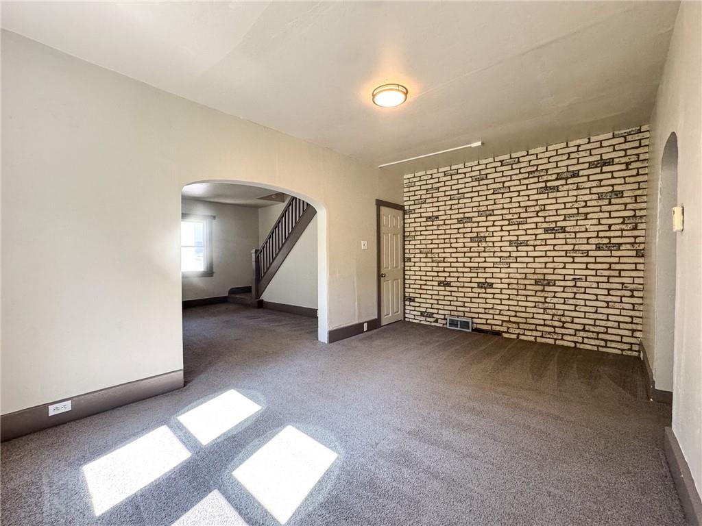 121 Heim Avenue Butler, PA 16001 - Photo 5 of 16 a view of an empty room with closet and utility room