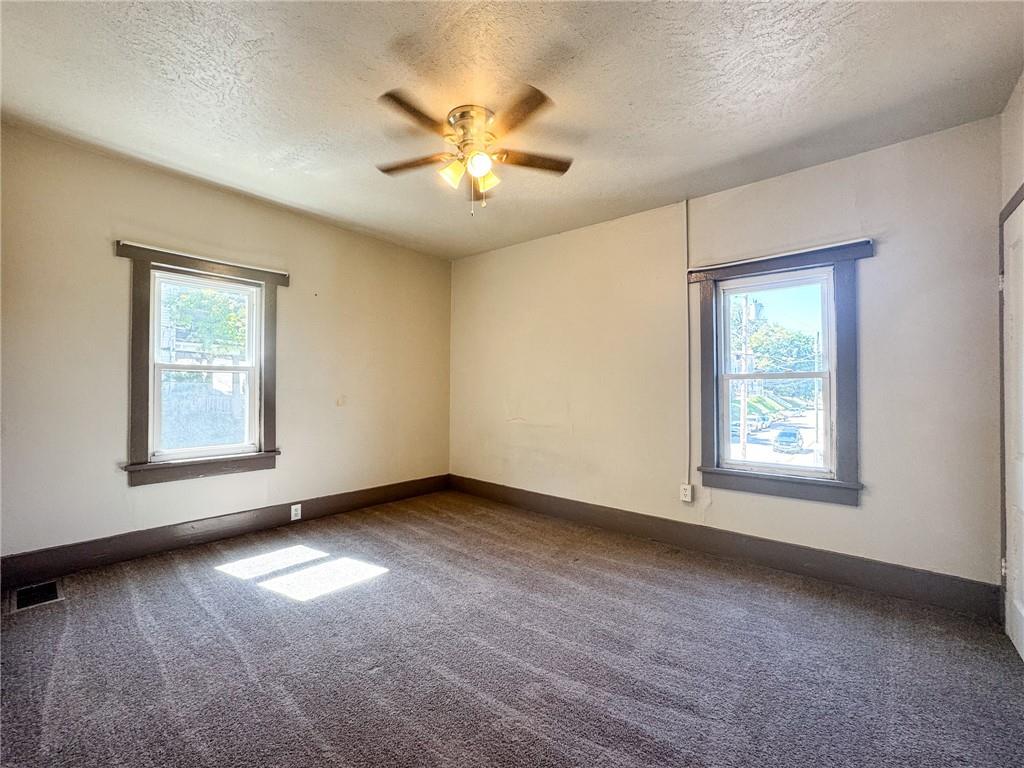 121 Heim Avenue Butler, PA 16001 - Photo 9 of 16 a view of an empty room with a window