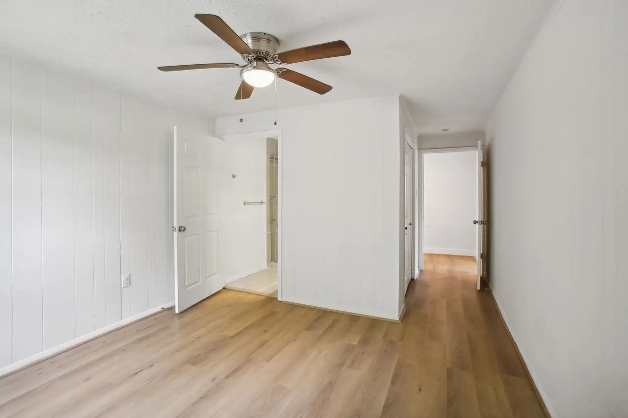 906 S Road Baytown, TX 77521 - Photo 11 of 32 wooden floor in an empty room
