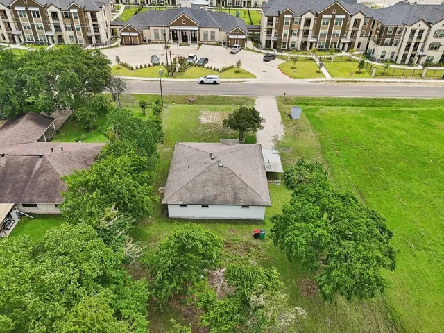a view of swimming pool with outdoor seating and yard