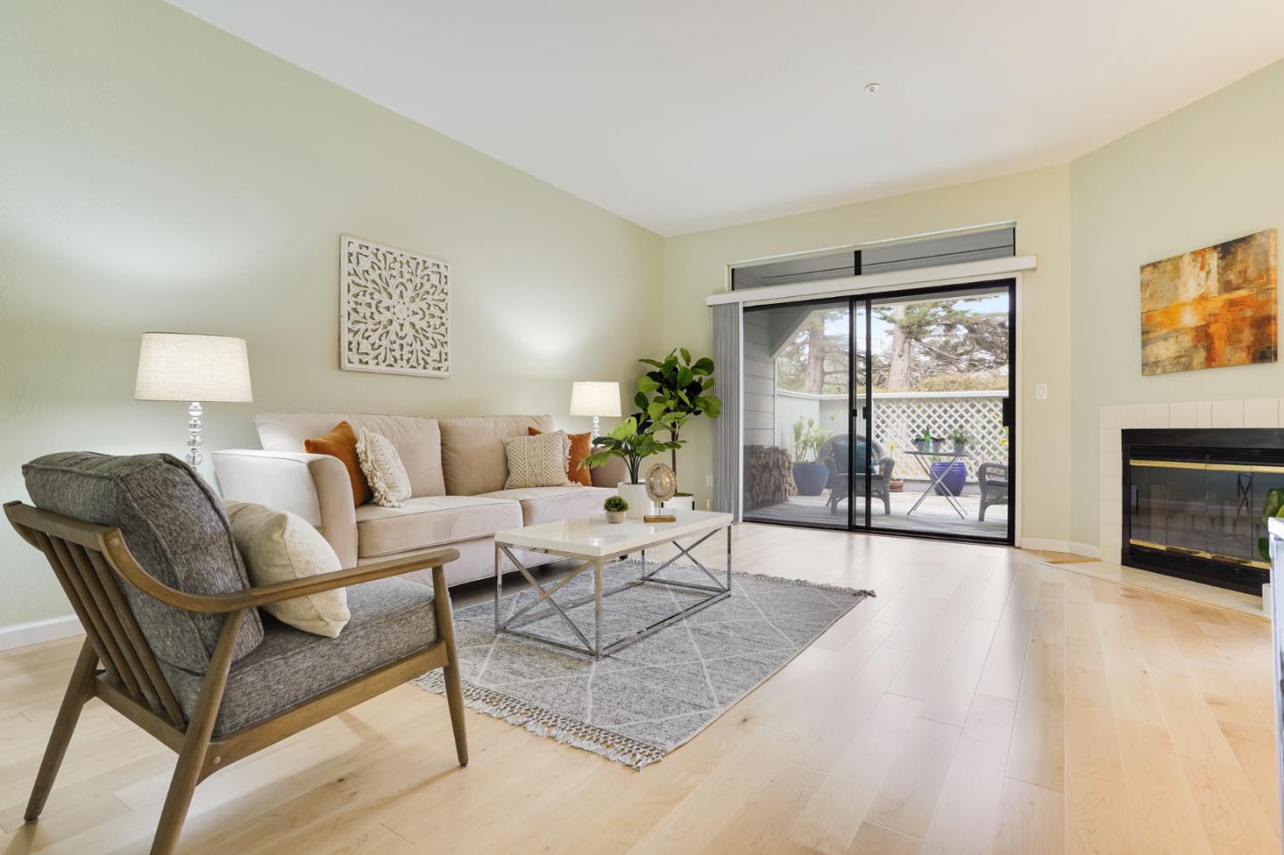 2601 Willowbrook Lane, Unit 9 Aptos, CA 95003 - Photo 1 of 29 a living room with furniture and a fireplace