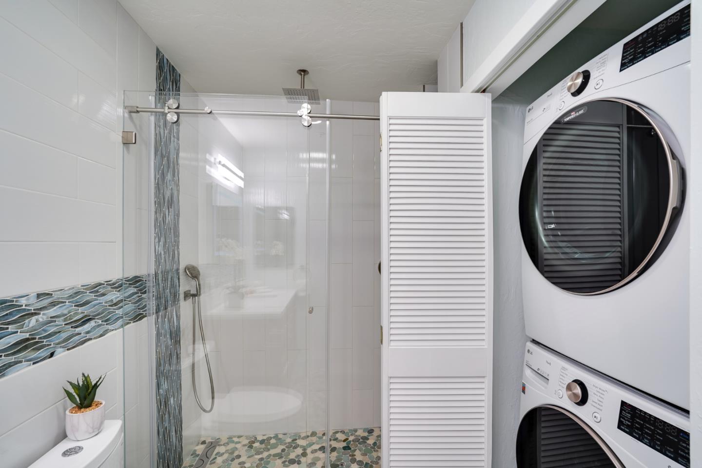 2601 Willowbrook Lane, Unit 9 Aptos, CA 95003 - Photo 12 of 29 a bathroom with a bathtub and shower